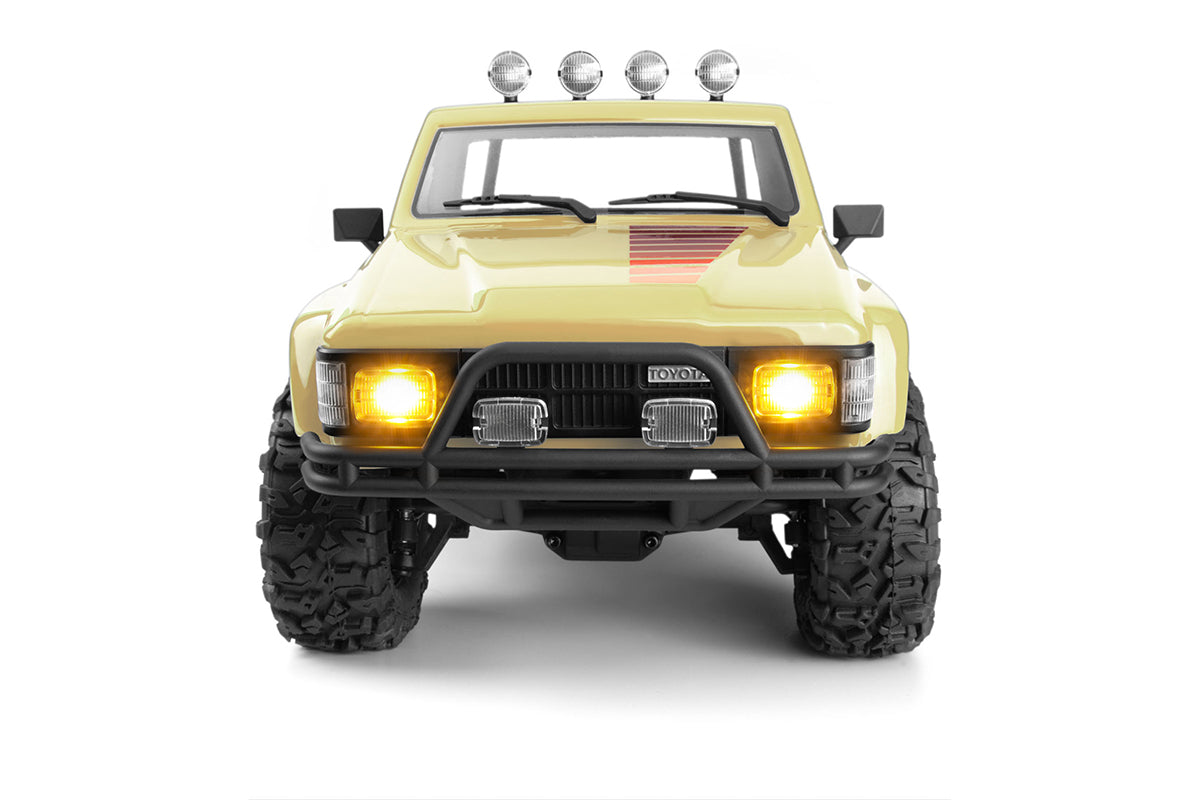 Venture18 Flux 1985 Toyota Hilux SR5 - Creme (T)